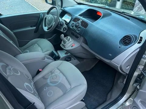Inside view of a small car showing the driver and passenger seats, dashboar.. Stock Photos