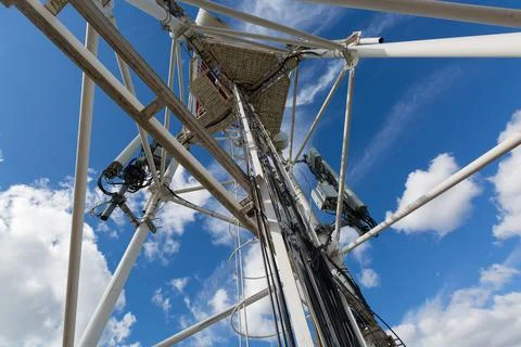 Inside view of telecommunication tower with microwave, radio panel antennas Stock Photos