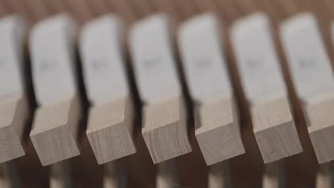 Inside view of upright piano musical instrument, wooden hammer for making Stock Footage 297056775