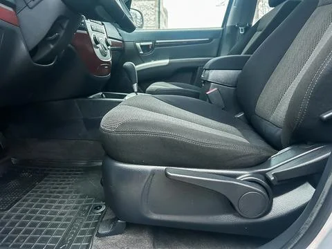 Inside view of a vehicle showing the front driver and passenger seats taken.. Stock Photos