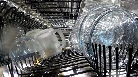 Inside view on washing of ware in the dishwasher Stock Footage