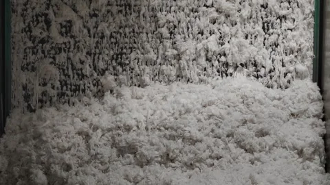 Inside view of wool fiber blending process in industrial cell machinery Stock Footage 346187859