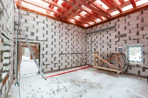 Inside view of working process of building house with wall made from foamed Stock Photos
