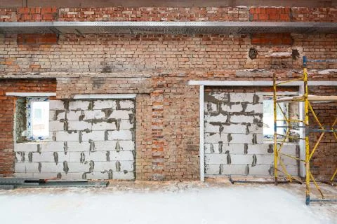 Inside view of working process of building house with wall made from foamed Stock Photos
