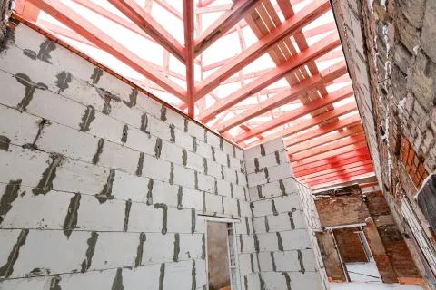 Inside view of working process of building house with wall made from foamed Stock Photos