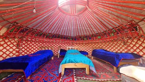 Inside view of a yurt, a circular tent in Kyrgyzstan. Stock Photos