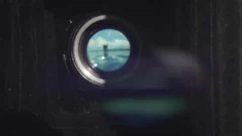 Inside a vintage photo camera with scene at the ocean Stock Footage 147189522