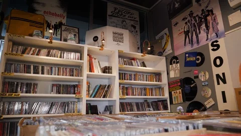 Inside of vinyl record shop with posters and decoration, Kuala Lumpur, Malaysia Stock Footage 146546647