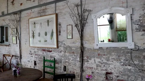 Inside wall pics and mirror at pythouse gardens cafe wiltshire 스톡 동영상 137398450