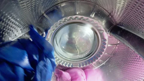 Inside a Washing Machine Drum During Wash Cycle with Spinning Clothes Stock-Footage 332908680