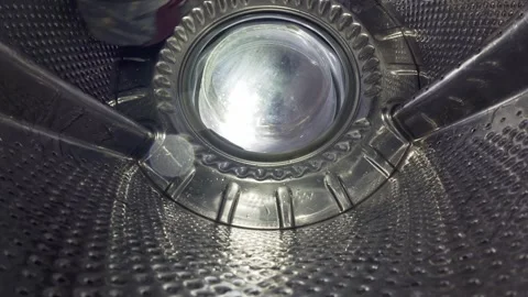 Inside a Washing Machine Drum During Wash Cycle with Spinning Clothes Stock-Footage 332908724