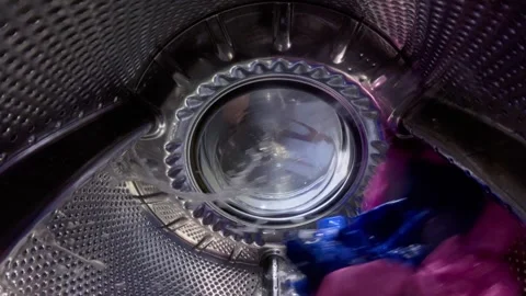Inside a Washing Machine Drum During Wash Cycle with Spinning Clothes Stock-Footage 332908773