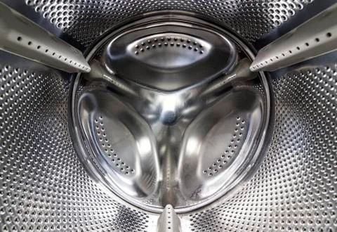 Inside of a washing machine drum Stock Photos