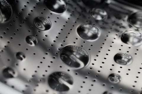 Inside of a washing machine drum Stock Photos