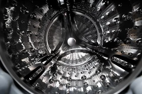 Inside of a washing machine drum Stock Photos