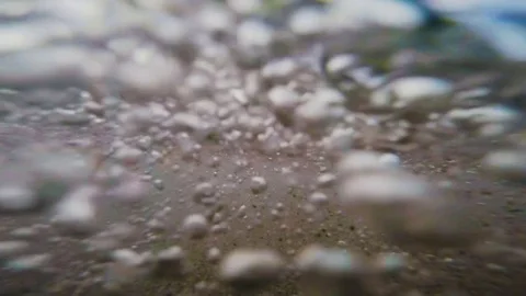 Inside a wave at the beach - under water perspective Stock-Footage 76096531