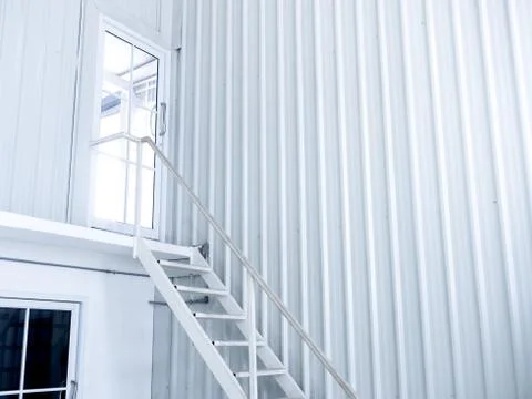 Inside white modern cutting-edge shipping container construction office build Stock Photos