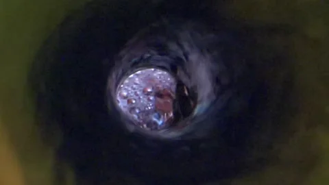Inside of a wine bottle, wine pouring out of a bottle Stock Footage 132024410