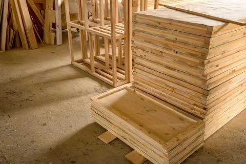 Inside woodworking workshop with lumber in front Stock-Fotos
