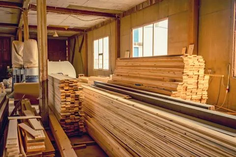 Inside woodworking workshop with lumber in front 写真素材