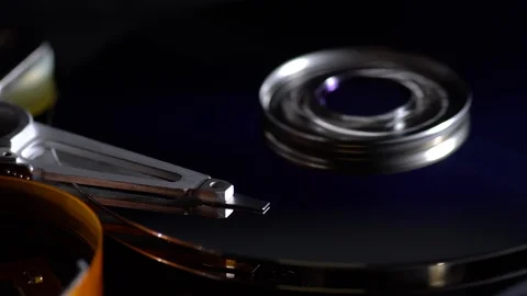 Inside a working computer hard disk drive dolly shot Stock Footage 95215623