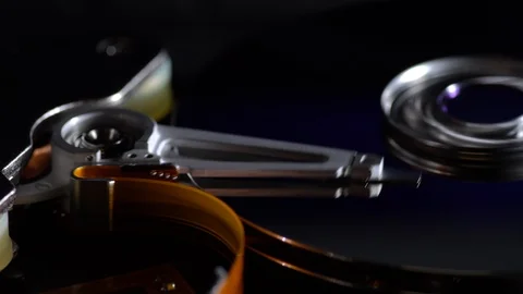 Inside a working computer hard disk drive dolly shot Stock Footage 95215644