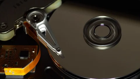 Inside a working computer hard disk drive read write data Stock Footage 95215691