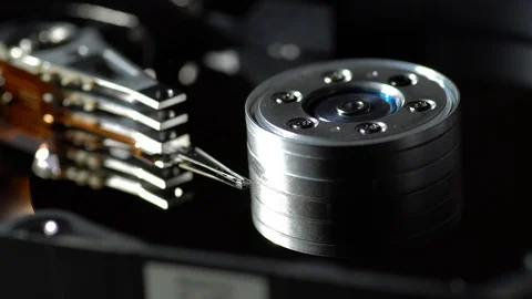 Inside a working computer hard disk drive dolly shot Stock Footage 95215725