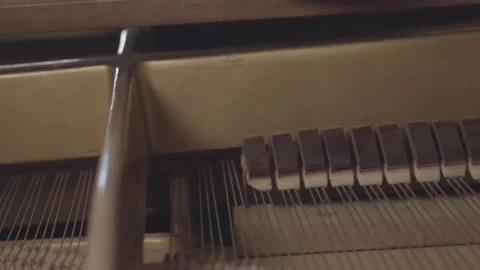 The inside of a working grand piano, closeup Stock Footage 135399264