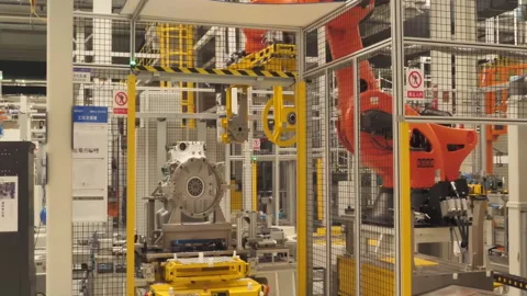 Inside workshop new robotic arms in high-tech industrial automation setup Stock Footage 310314941