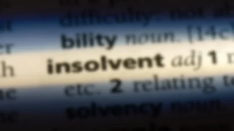 Insolvent word in a dictionary. Stock Footage 99561372
