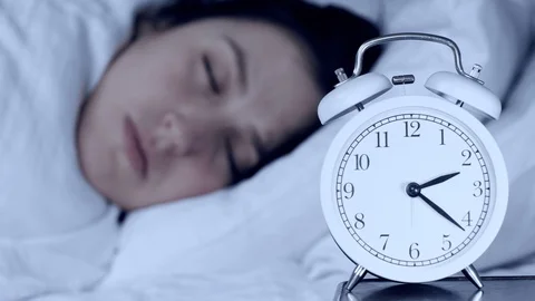 Insomnia, anxiety, problems concepts. Attractive caucasian girl at night in bed 動画素材 127352121