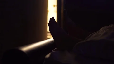 Insomnia Problem For A Man Who Cannot Sleep At Night, Feet Detail Stock Footage 83717109