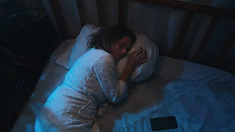 Insomnia, sleepless nights and difficulty falling asleep. Stock Footage 265407223