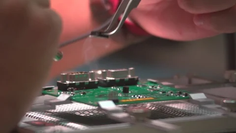 Inspecting a circuit board Stock Footage 106958168