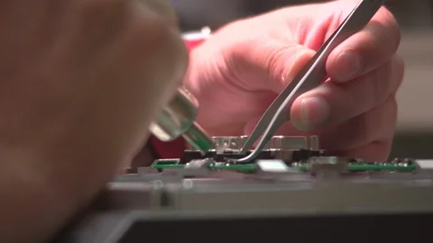 Inspecting a circuit board Stock Footage 106958179