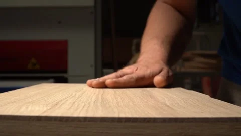 Inspecting the Edge of Sanded Wood Vídeos de archivo 293541891