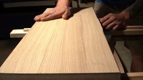 Inspecting the Edge of Sanded Wood Vídeos de archivo 293541894