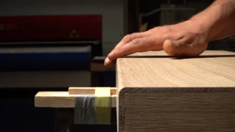 Inspecting the Edge of Sanded Wood Vídeos de archivo 293543049