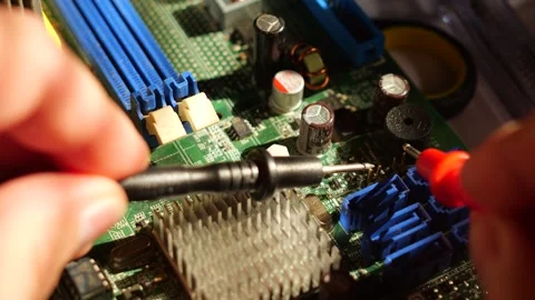 Inspecting Electronic Components with Precision Tools Video stock 345009953