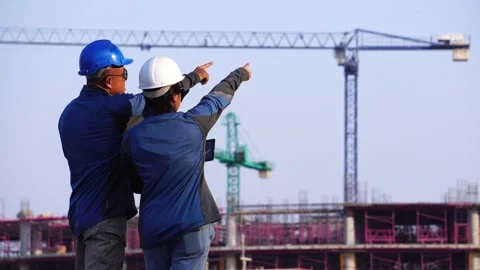 Inspecting Engineer in Construction Site Stock Footage 147604567