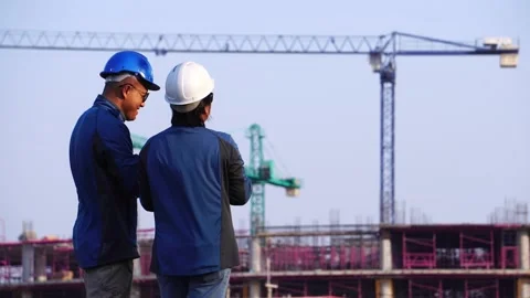 Inspecting Engineer in Construction Site 库存影片 147604595