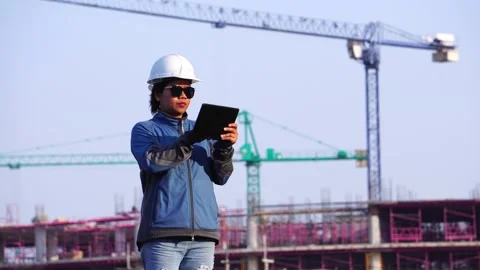 Inspecting Engineer in Construction Site Video stock 147606964