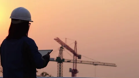 Inspecting Engineer in Construction Site footage slow motion Видео 124847187