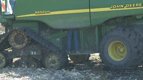 Inspecting harvester Stock Footage 755382