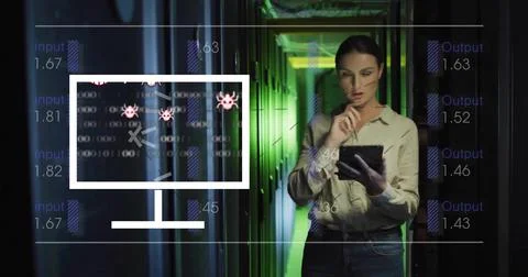 Inspecting IT pro in beige top scanning tablet among server racks with malware Stock Photos
