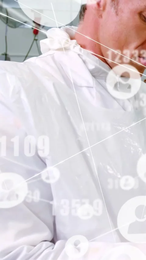 Inspecting lab tech in white gown hairnet, turning and checking pipes, red valve Stock Footage 331168862