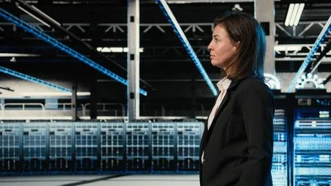 Inspecting rigs, VFX compositing and manager in data center Foto stock
