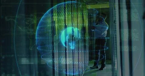 Inspecting tech in light shirt checking server racks in datacenter with hologram Foto stock