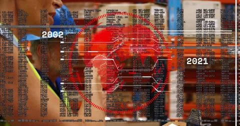 Inspecting two warehouse workers checking tablet by racks, wearing blue hard Foto stock